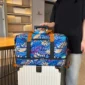 Sac de voyage à motifs tropical avec bandoulière-fixation valise