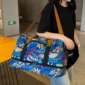 Sac de voyage à motifs tropical avec bandoulière-porté bandoulière